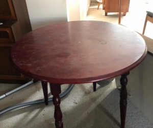 round woodenn table mahogany colour