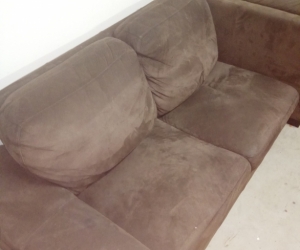 Brown L shaped couch