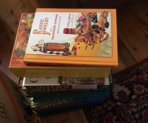 Carters Price Guides (8) and a reference text on plastic jewellery