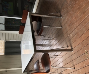 Glass dining table and four chairs