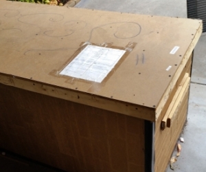 Large packing crate with lid.