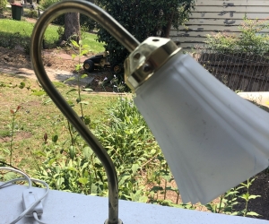 Antique brass bedside light and frosted glass shade - works