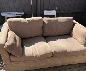 Two seater couch.