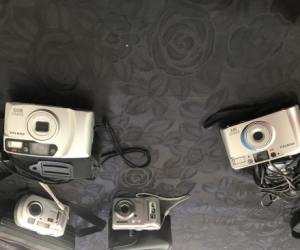 4 assorted digital and non digital cameras