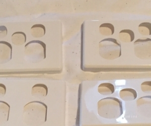 4 white Clipsal Power point covers