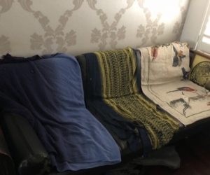 Couch (wood, black), and 2x armchairs (all same design). The frames are in excellent condition, but the vinyl covers on the foam cushions are peeling.