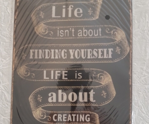 Metal printed slogan sign