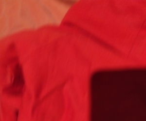 Red sweaters/ t shirts and black shorts size 8-10