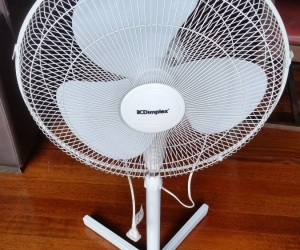 Dimplex oscillating fan on stand.