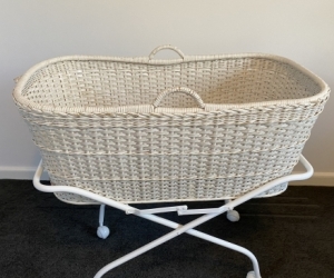 White wicker bassinet