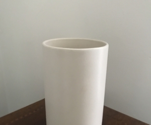 Simple white ceramic vase. 18cm tall.