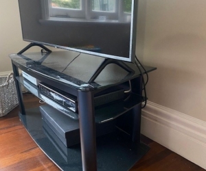 Glass top TV stand