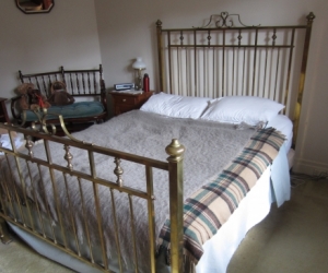 Antique brass bed, queen size.