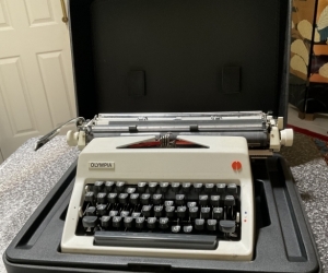 Olympia typewriter with case — made in West Germany