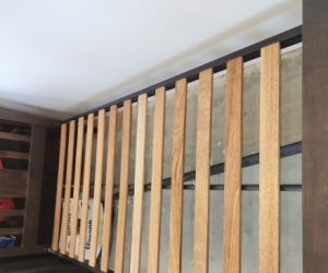 2 wooden single beds, 1 mattress's, maybe 2.